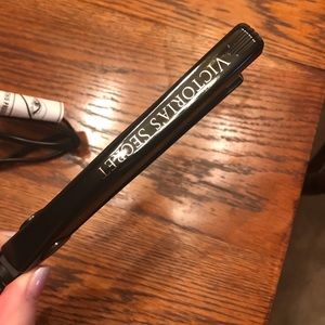 Mini flat iron with travel bag and hair clip